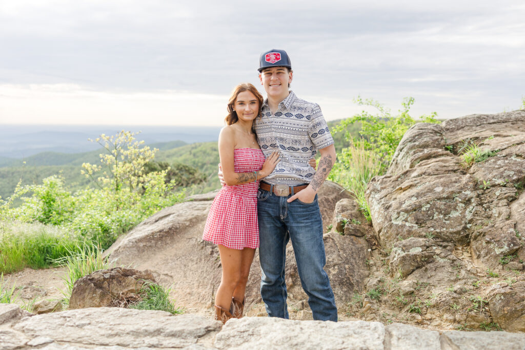 Couple embracing during golden hour photo session in Shenandoah National Park