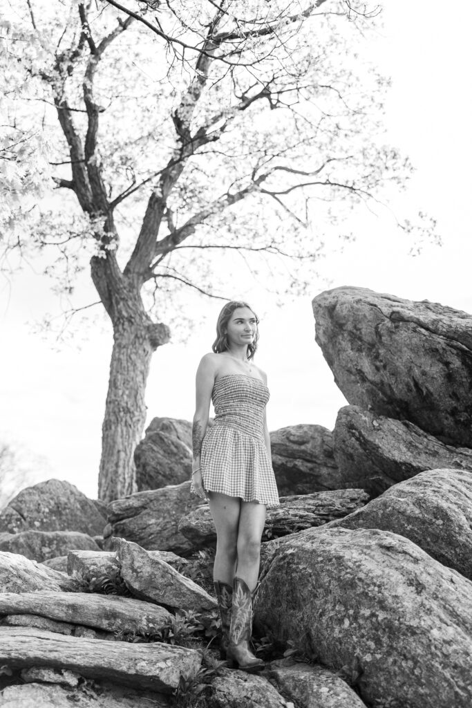 senior looking away at Skyline Drive overlook in Shenandoah National Park