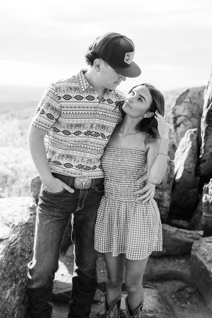 Couple embracing during golden hour photo session in Shenandoah National Park