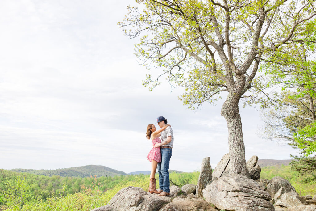 couple hugging at Shenandoah National Park on a rock